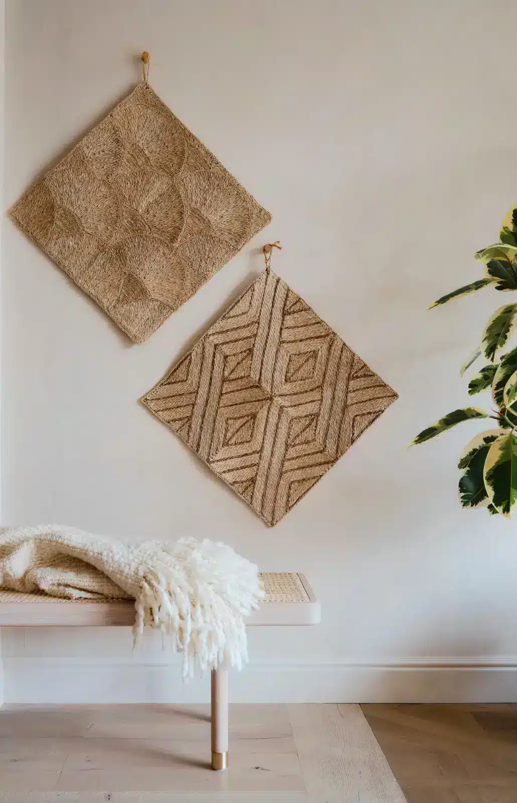 Custom Handwoven Anahaw Scallop and Knottsville Rugs in Natural Beige and Brown Abaca Banana Plant Fibre in London Showroom with Woven Bench and Chunky Cream Throw